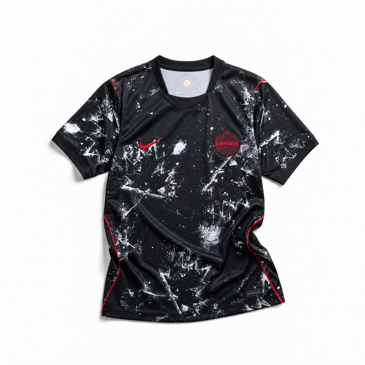 Maglia Canada Away 2026 World Cup nera vista frontale pattern astratto spray
