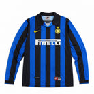 Fronte kit home Inter 1998/99 strisce nerazzurre, colletto a polo e stella dorata.
