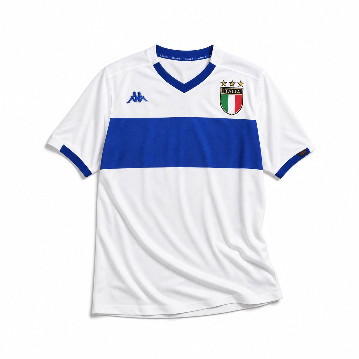 Fronte maglia away Italia 1999/00 con stemma FIGC e dettagli blu sul colletto.
