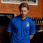 Fronte maglia home Italia 1994 con stemma FIGC e dettagli tricolore sul colletto.
