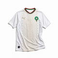 Maglia Away Marocco 2026 World Cup colore bianco con dettagli decorativi vista frontale.
