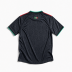 Retro maglia third El Tri FIFA World Cup 2026 — tessuto nero con trama decorativa ispirata alla cultura azteca, maniche corte con profili tricolori sulle spalle