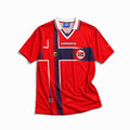 Norvegia Maglia Home 1997/98 World Cup vista frontale con design rosso, dettagli blu e bianchi e colletto classico.