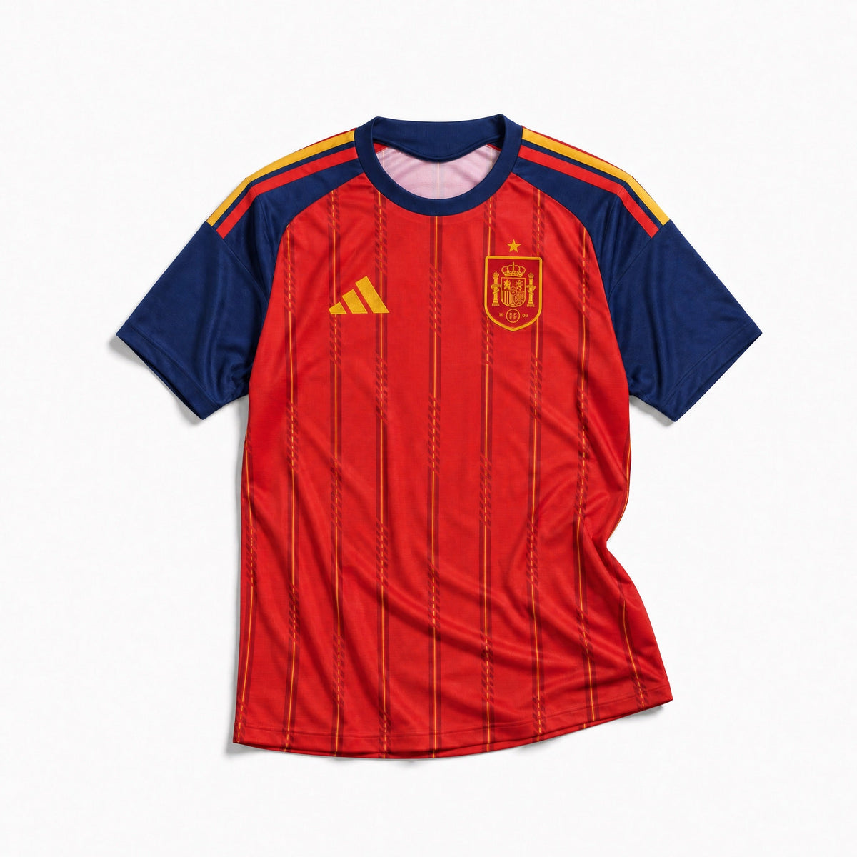 Fronte della maglia home della Spagna 2026 rossa con pannelli scuri sulle maniche e stemma sul petto