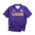 Fronte maglia home Fiorentina 1989/90 con stemma circolare e colletto a polo.